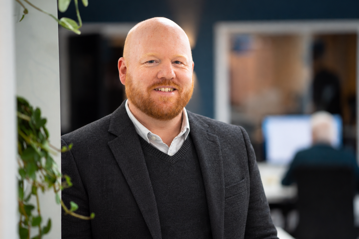 Ginger-bearded office portrait in charcoal layers-2